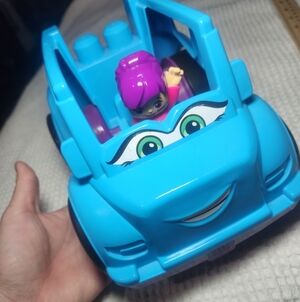 Blue Mega Bloks Toy Car with Purple Figure